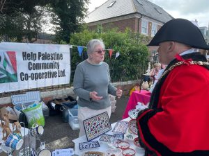 Mayor at a stall selling fair trade products from Palestine at the Michaelmas Fair in Alverstoke 2023