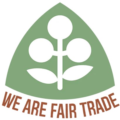 logo of a white plant on a green triangle